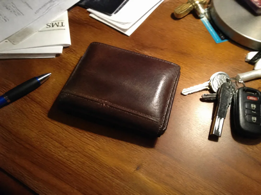 Original SizeSpec demo image of a brown wallet on a desk